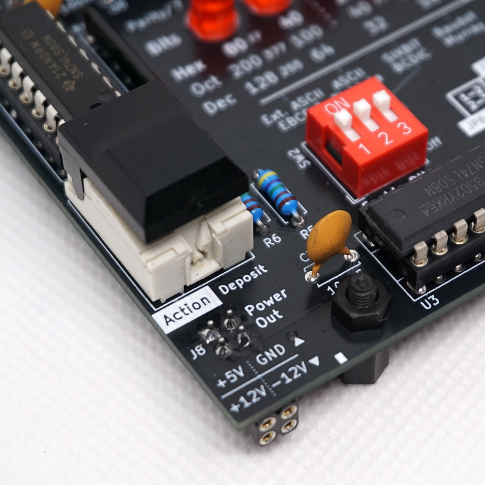 A clicky action-button provides a properly debounced TTL signal