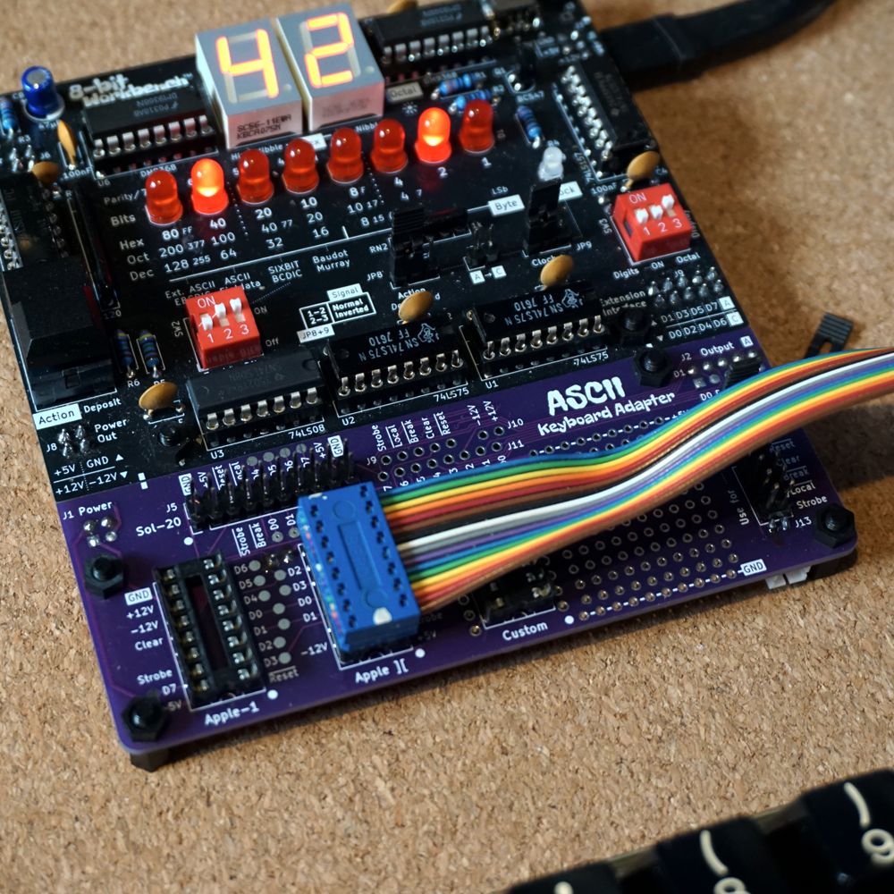 ASCII Keyboard Adapter connected to an 8-bit Workbench testing an Apple 2 keyboard