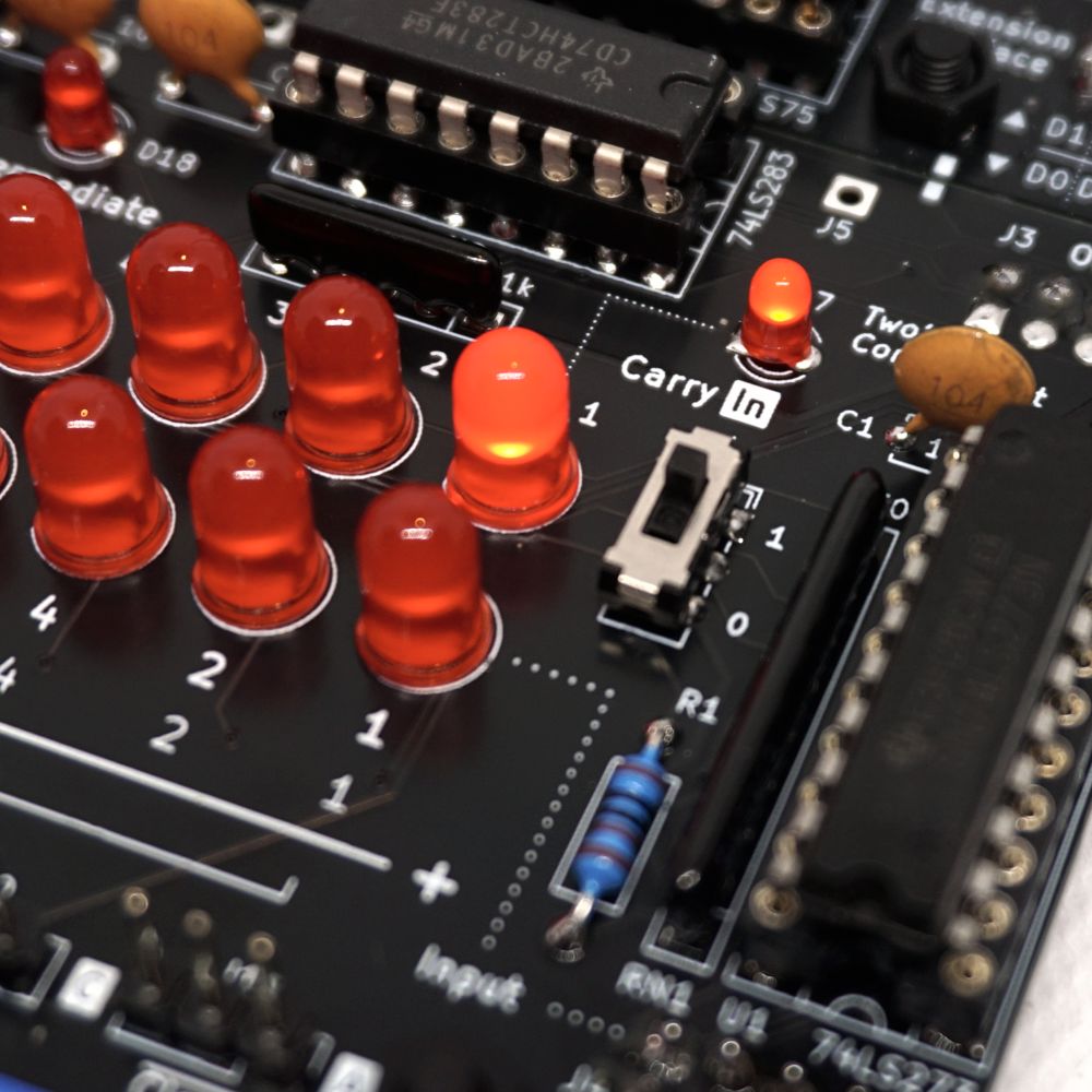 Carries are visualized using LEDs. The carry-in can be set using a slide switch