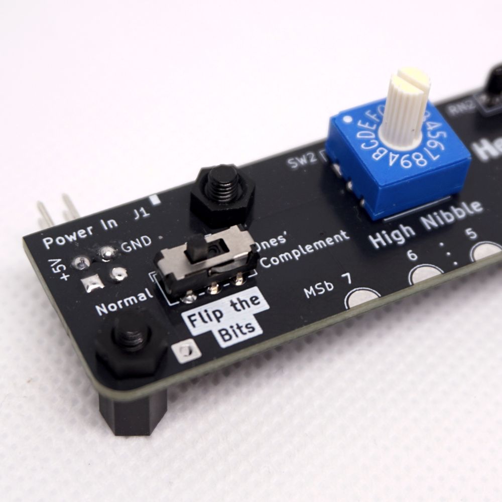 Use a switch to flip the bits and create the ones' complement